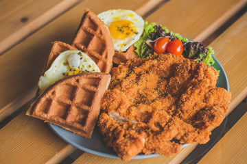 Chicken cutlet Waffle with Sunny Side Up Egg and salad