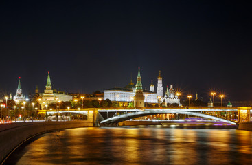sight of Moscow Kremlin and Bolshoy Kamenny Bridge on Moskva River at night