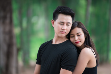 Picture of asian couple in love have fun,Happy people concept,Thailand people,Love is everything,Hug from back