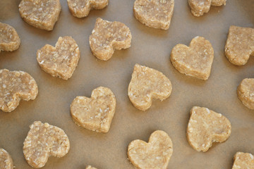 Fototapeta na wymiar Raw heart cookies Baking tray