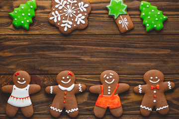 Christmas homemade gingerbread cookies and spices on the wooden
