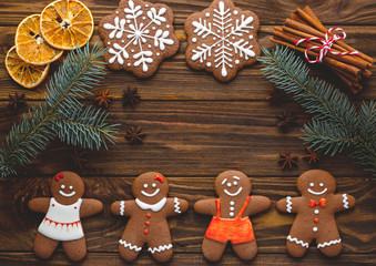 Christmas homemade gingerbread cookies and spices on the wooden