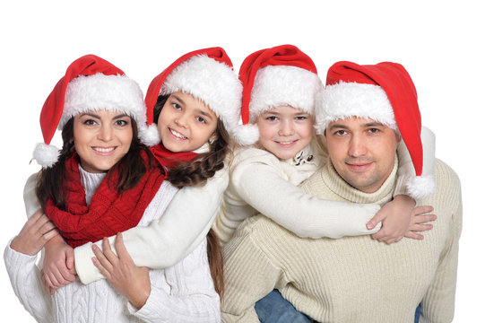 Family with kids in santa hats on white background - Powered by Adobe
