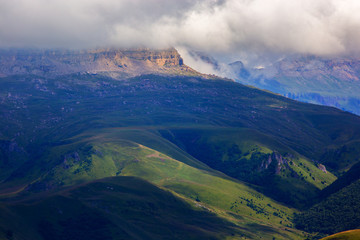 View of the mountain plateau in the clouds in the summer in the North Caucasus in Russia.