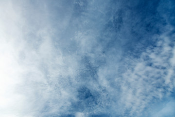 Blue sky with whispy clouds