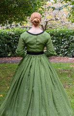 Fototapeta premium Victorian woman in green dress