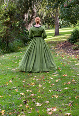 Fototapeta premium Victorian woman in green dress