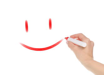 Hand marker draws smiley on white background isolation