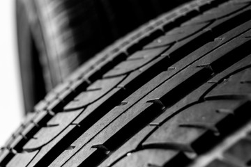 Summer car tires on a white background