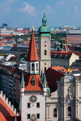 Obraz premium View of Munich city, Heilig Geist Kirche (Church of the Holy Spirit) and Old Town Hall (Altes Rathaus). Munich, Germany