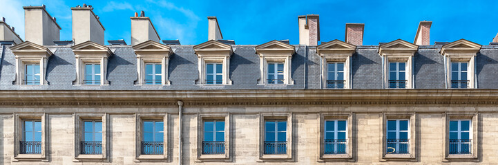 Paris, panorama of a beautiful building rue Royale, windows, detail
