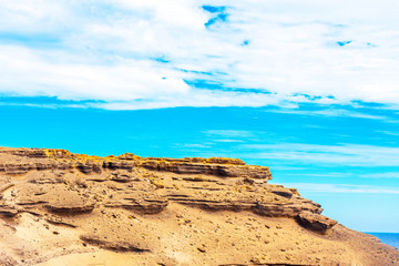 Fototapeta na wymiar View of the rocks on the beach Papakolea (green sand beach), Hawaii, USA.