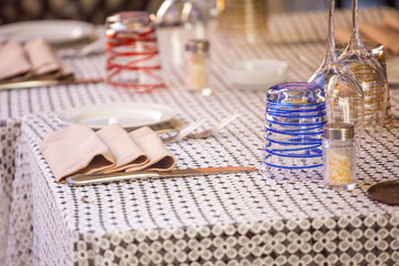 Fototapeta na wymiar Laid table. Table setting. Preparing to feast