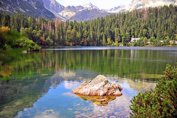 Natural landscape with alpine lake and forest