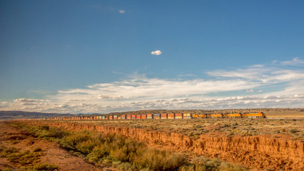 Long freight train outside Albuquerque, New Mexico, seen from a train.