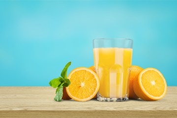Orange juice and slices of orange on background © BillionPhotos.com