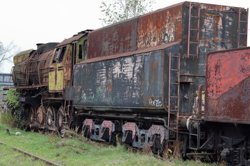 Fototapeta na wymiar Old locomotive, abandoned, rusty, Krakow, Plaszow