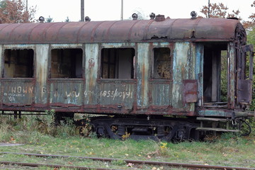 Fototapeta na wymiar Old train wagon, abandoned, rusty, Krakow, Plaszow