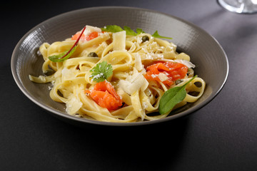 Traditional pasta with salmon