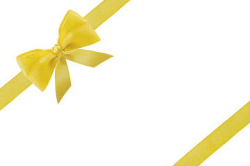 Golden or yellow bow ribbon with tails isolated on white background. Gift ribbon for Christmas box.