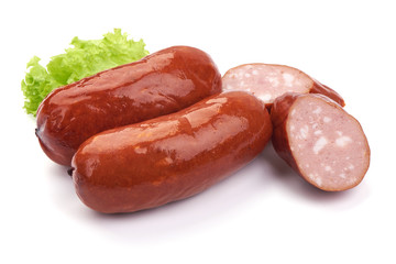 Bavarian Grilled Sliced Sausages with lettuce, Close-up, isolated on a white background.
