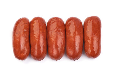 Hungarian or German grilled sausages. Isolated on a white background. Close-up. Top view.