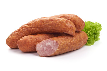 German specialty salami. Hard cured sausage with lettuce, Close-up, isolated on a white background.