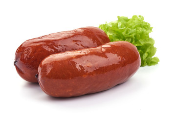 Tasty Grilled Sausages with lettuce, Close-up, isolated on a white background.