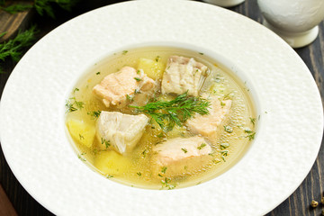 fish soup with ingredients and spices for cooking.
