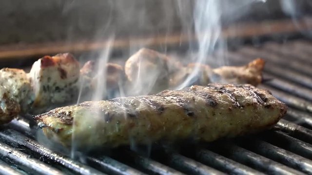 Stuffed burgers that are baked on the grill.
Melted cheese and flames with smoke.