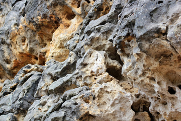 Rock layers - a colorful formations of rocks stacked over the hundreds of years. Interesting background with fascinating texture.