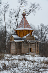 A wooden church under construction in a monastery in Russia