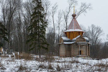 A wooden church under construction in a monastery in Russia