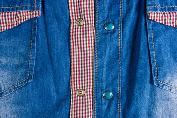 Blue washed faded jeans texture with seams, clasps, buttons and rivets