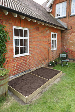 Empty Raised Bed In Kitchen Garden