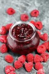 raspberry jam with fresh raspberries. marmalade in jar