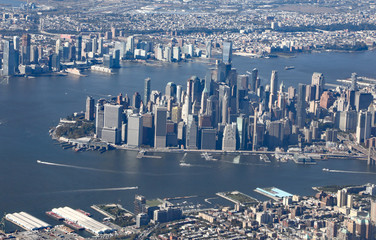 Aerial view of lower Manhattan, with the Wall Street financial district, and Brooklyn, plus the Hudson and East Rivers.