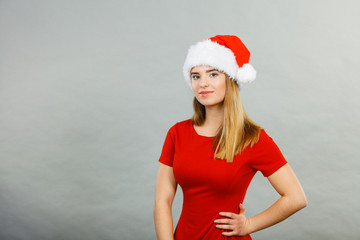 Obraz premium Woman wearing Santa Claus helper costume