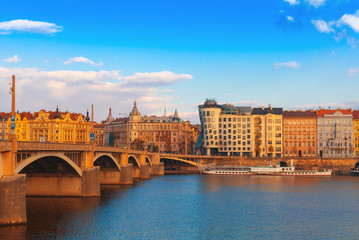 Prague city, embankment along the Vltava, reflected in the water