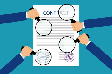 Hands holding magnifying glasses on a contract.