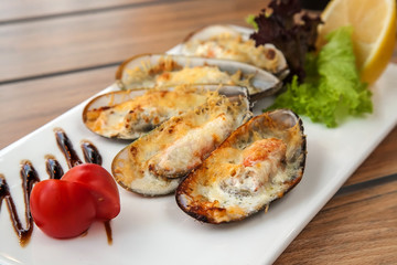 Mussels baked in the shell