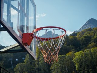Basketball hoop and mountain Krasnaya Polyana Sochi 09/29/2018 © jockermax3d