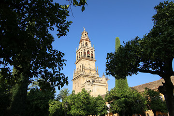 Church tower against blue sky