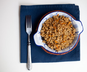 Spelt porridge with mushrooms and vegetables