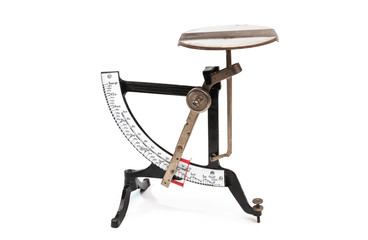 Vintage letter scale with enamel scales, isolated with white background