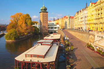 Prague city, embankment along the Vltava, reflected in the water