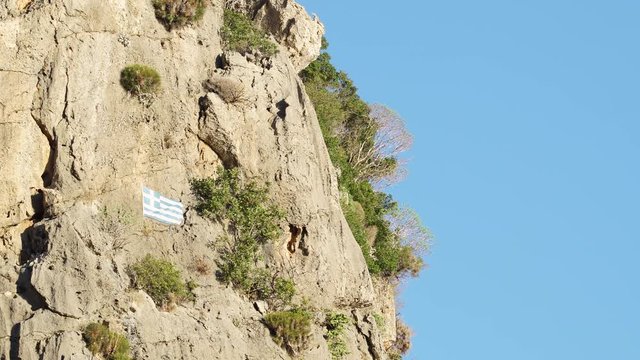 Greek flag on rock in Taygetus mountains Greece Peloponnese, Europe 4K