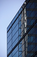 Fototapeta na wymiar Rectangular glass facade of modern building