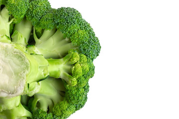 Fresh broccoli on a white background. Green broccoli closeup isolated on a white background. Top view.