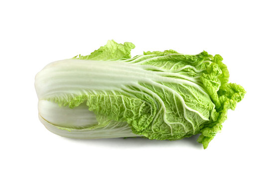 Peking cabbage on a white background. Fresh Peking cabbage close up isolated on white background.
